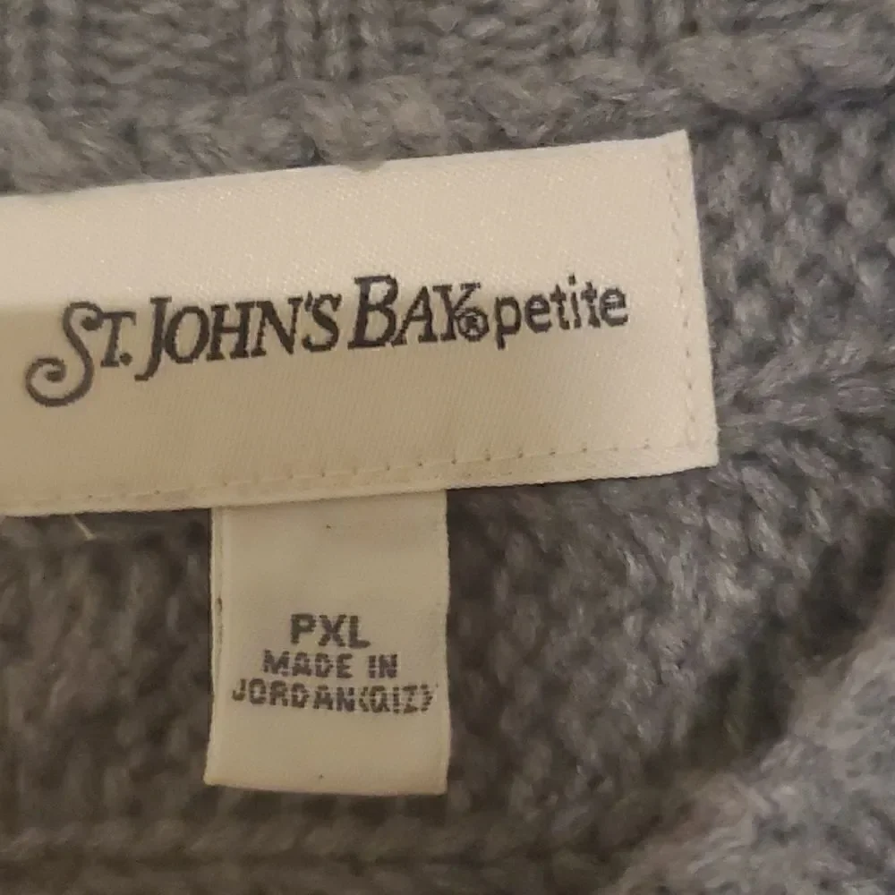 Three top button knit sweater